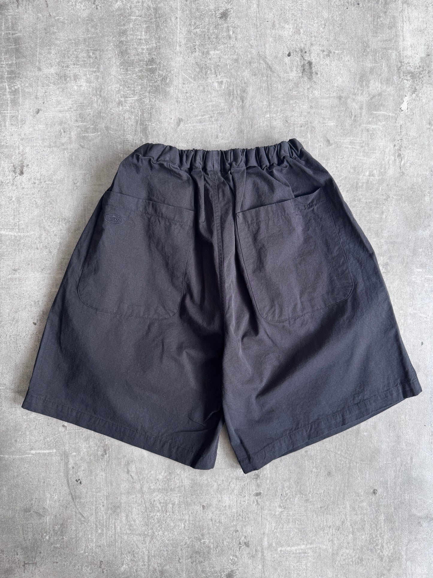 Kappy Korea Two Tuck Pleated Wide Half Pants - Black
