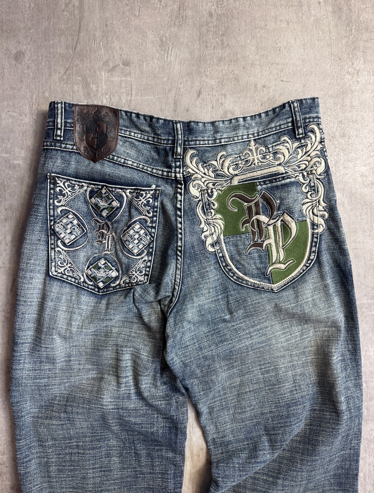 Pelle Pelle Embroidered Logo Crest Distressed Jeans
