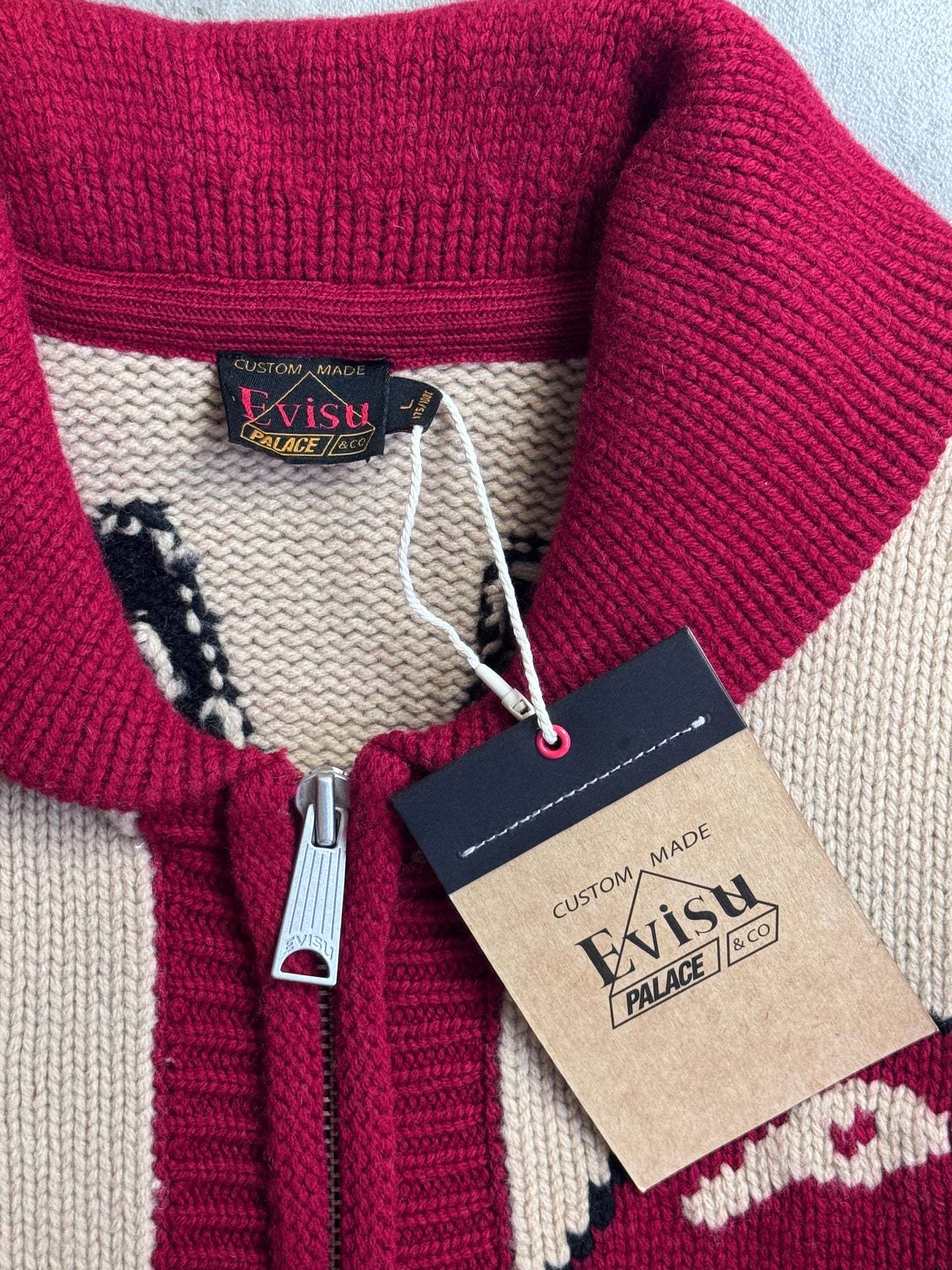 S/S 2024 Palace x Evisu Red Lined Full Zip Beige Wool Knit Cowichan Cardigan