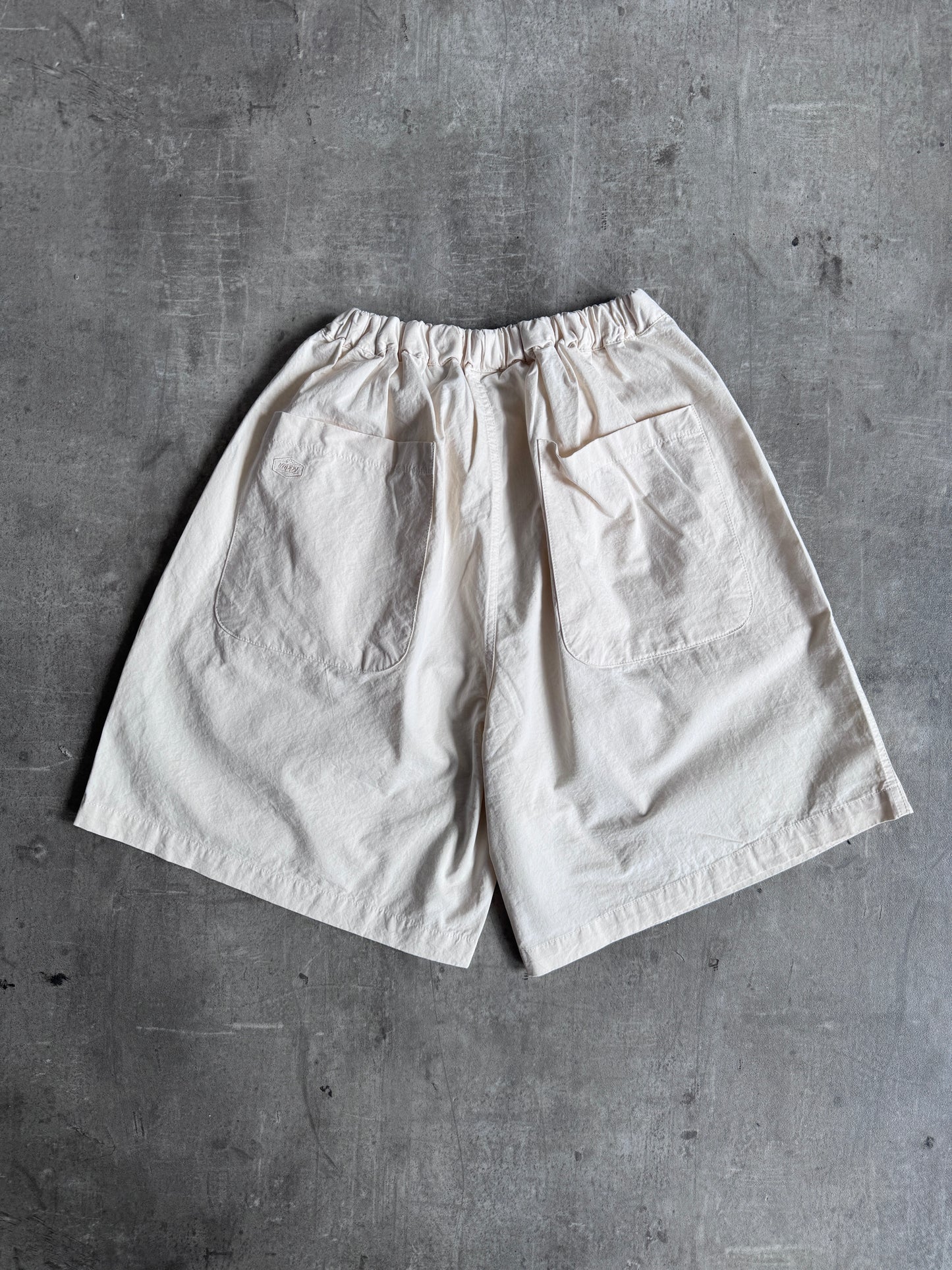 Kappy Korea Two Tuck Pleated Wide Half Pants - Cream