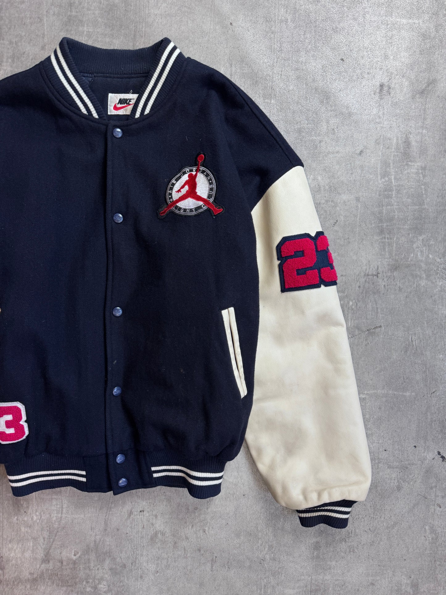 Nike Jordans 'Why Fly' Patch Embellished Black Fleece Lined White Leather Sleeve Varsity