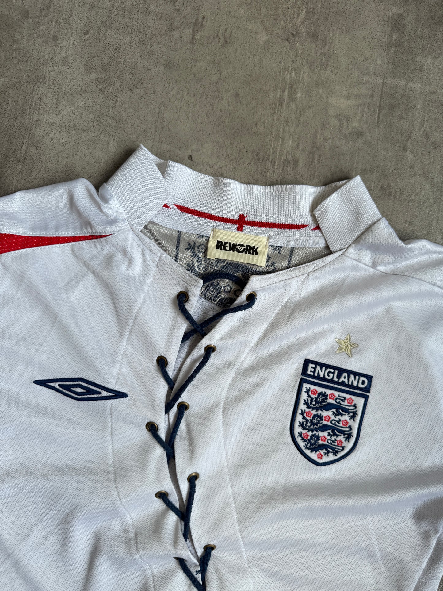 VT Rework: England White Asymmetric Lace Front Tee
