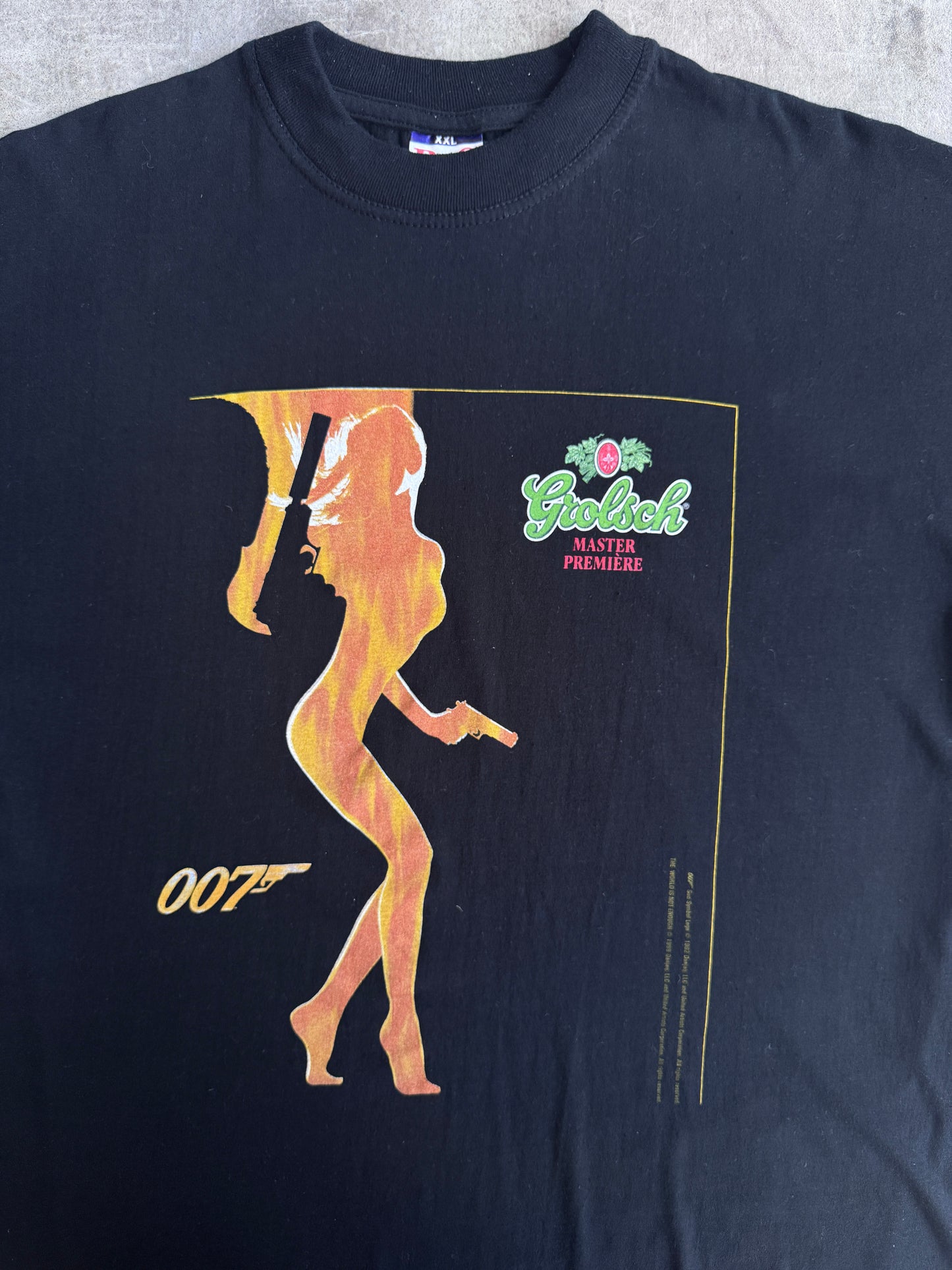 1999 James Bond " The World Isz Not Enough" Grolsch Premier Graphic Tee
