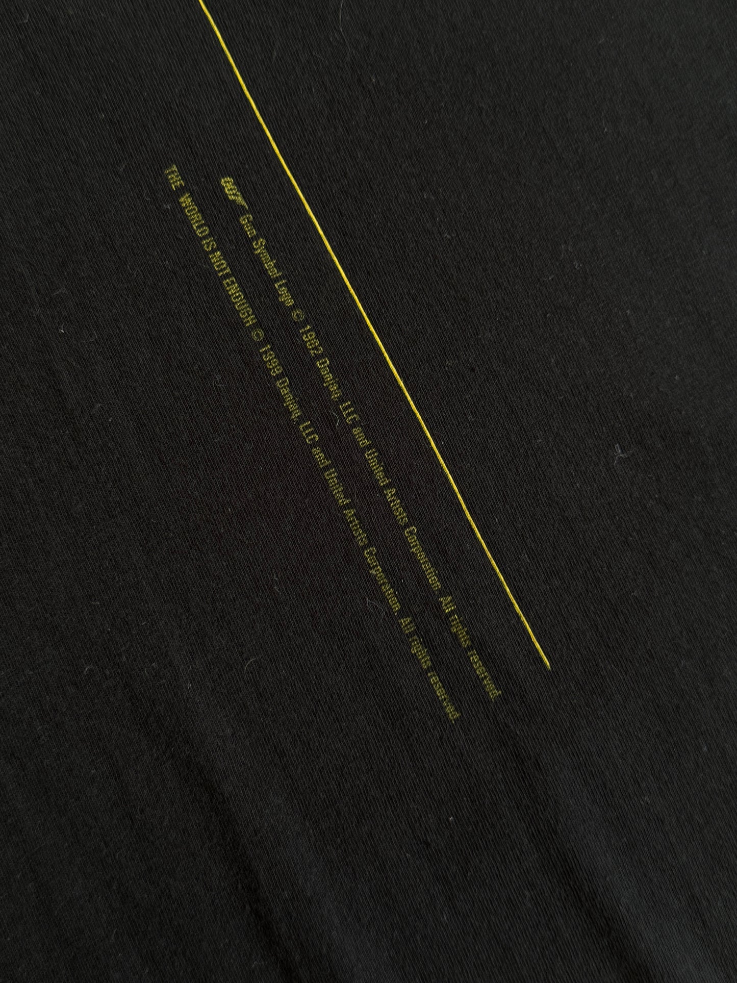 1999 James Bond " The World Isz Not Enough" Grolsch Premier Graphic Tee