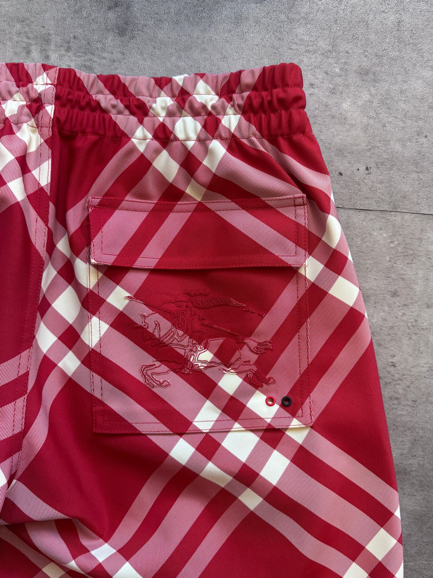Burberry Red Nova Check Nylon Cargo Trousers. FA : 276